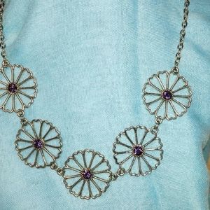 Flowers with light purple stones silvertone